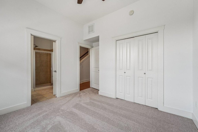 2520 Bluebonnet Ln Unit 48, Austin, TX 78704 - unfurnished bedroom with carpet floors, a closet, ensuite bathroom, and ceiling fan