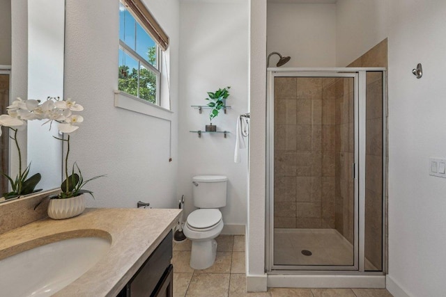 2520 Bluebonnet Ln Unit 48, Austin, TX 78704 - bathroom with vanity, a stall shower, and tile patterned flooring