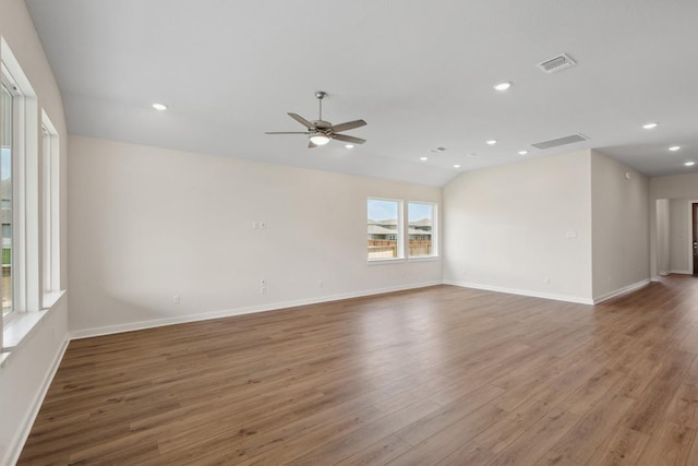 1754 Sawmill Xing, Round Rock, TX 78665 - spare room featuring wood finished floors, a ceiling fan, and recessed lighting