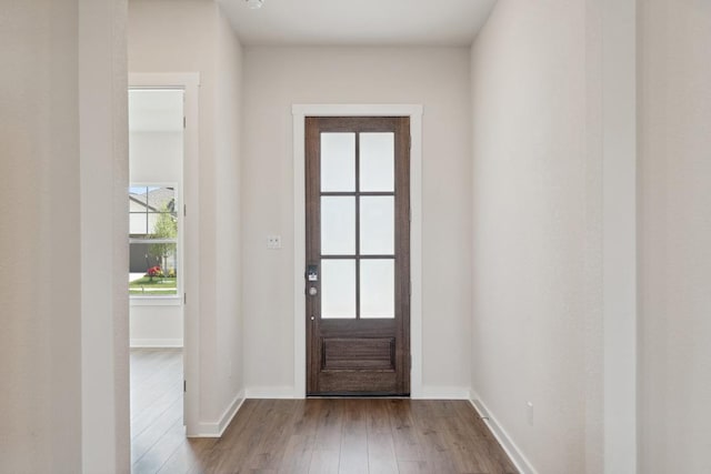 1754 Sawmill Xing, Round Rock, TX 78665 - foyer entrance with dark wood-style flooring and baseboards