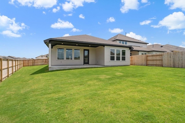 1754 Sawmill Xing, Round Rock, TX 78665 - back of property with a fenced backyard and a patio