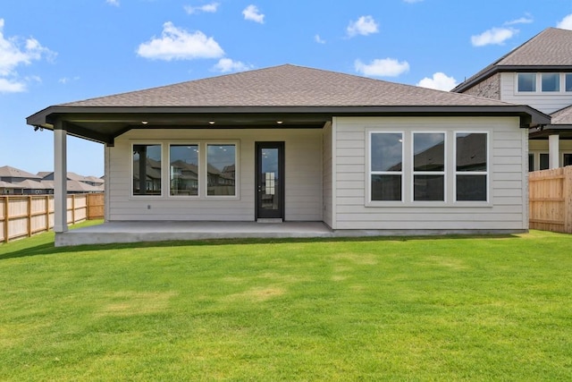 1754 Sawmill Xing, Round Rock, TX 78665 - rear view of house with a patio and a shingled roof