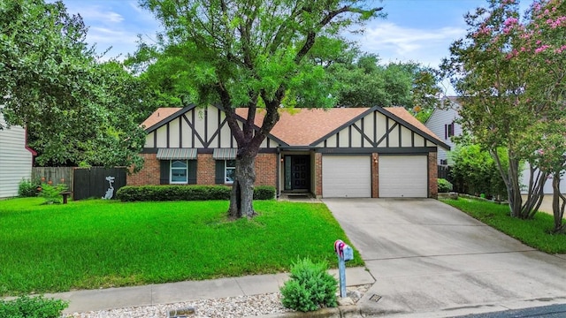 1305 Doonesbury Dr, Austin, TX 78758 - tudor-style house featuring a garage, brick siding, and concrete driveway
