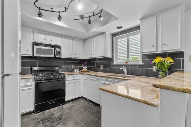 1305 Doonesbury Dr, Austin, TX 78758 - kitchen with white appliances, white cabinets, decorative backsplash, and light stone counters