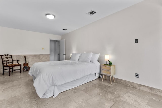 1305 Doonesbury Dr, Austin, TX 78758 - bedroom with light stone finish flooring