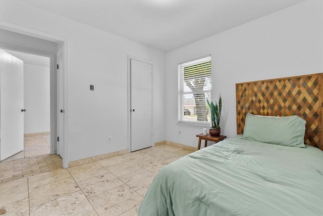 1305 Doonesbury Dr, Austin, TX 78758 - bedroom featuring baseboards