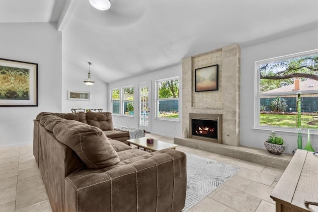 1305 Doonesbury Dr, Austin, TX 78758 - living area featuring healthy amount of natural light, a fireplace, and light tile patterned floors
