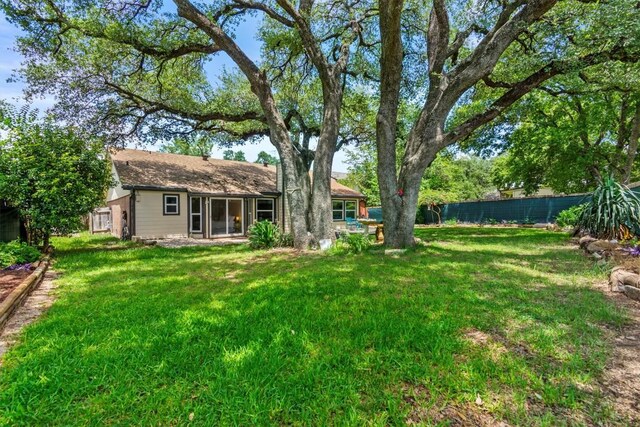 1305 Doonesbury Dr, Austin, TX 78758 - view of fenced backyard