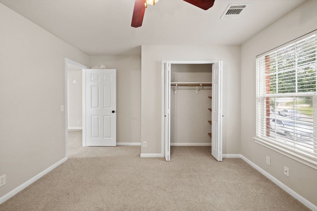 2732 Cascade Falls Dr, Austin, TX 78738 - unfurnished bedroom with light carpet, a ceiling fan, and a closet