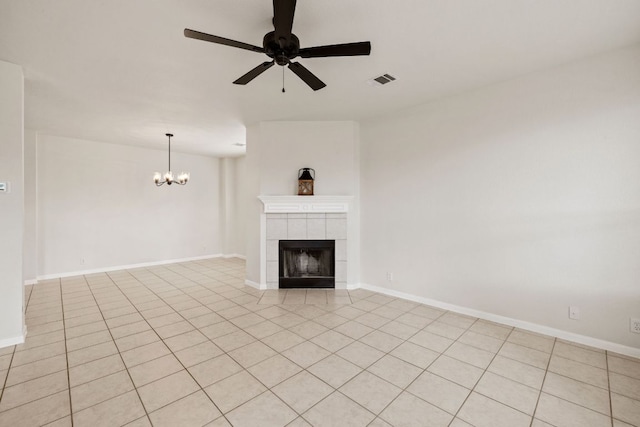 2732 Cascade Falls Dr, Austin, TX 78738 - unfurnished living room with ceiling fan, a chandelier, a tile fireplace, and light tile patterned flooring