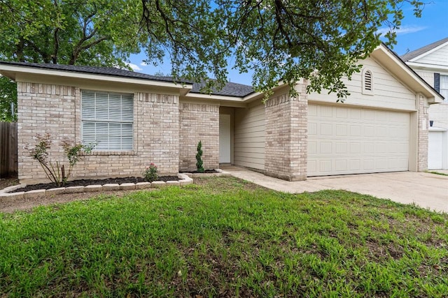 2012 Charlotte Way, Round Rock, TX 78664 - view of front of property featuring a garage, concrete driveway, a front yard, and brick siding