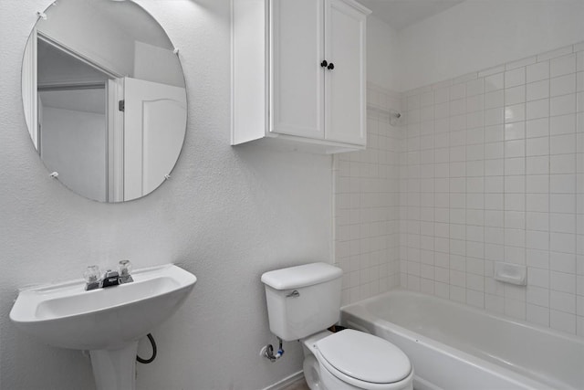 2012 Charlotte Way, Round Rock, TX 78664 - bathroom featuring toilet and shower / tub combination