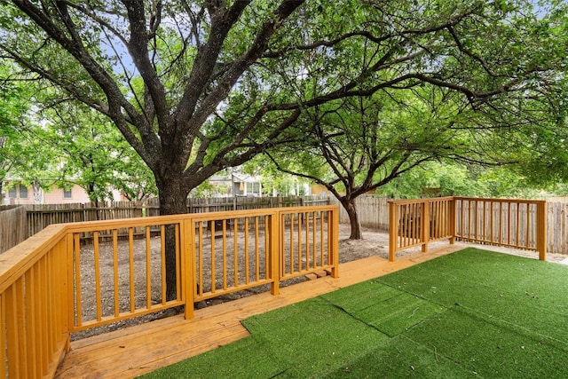 2012 Charlotte Way, Round Rock, TX 78664 - fenced backyard featuring a wooden deck