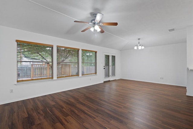 2012 Charlotte Way, Round Rock, TX 78664 - unfurnished room with plenty of natural light, ceiling fan, a chandelier, wood finished floors, and vaulted ceiling