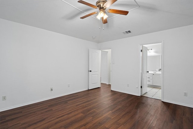 2012 Charlotte Way, Round Rock, TX 78664 - unfurnished bedroom with wood finished floors, ensuite bath, and ceiling fan