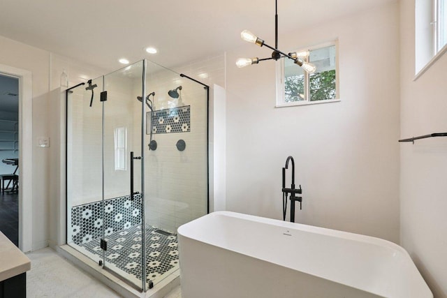 1916 Pecan St, Bastrop, TX 78602 - full bathroom featuring a soaking tub, a stall shower, healthy amount of natural light, recessed lighting, and vanity