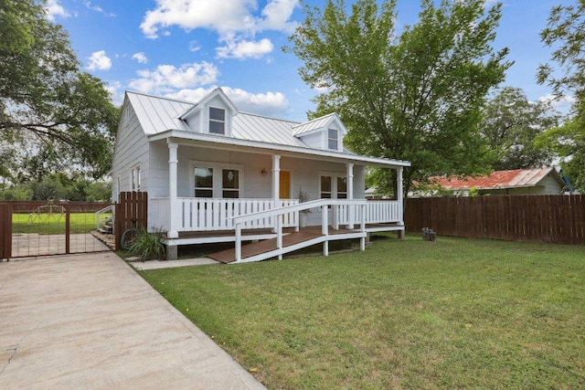 1916 Pecan St, Bastrop, TX 78602 - view of front facade featuring a porch and a metal roof