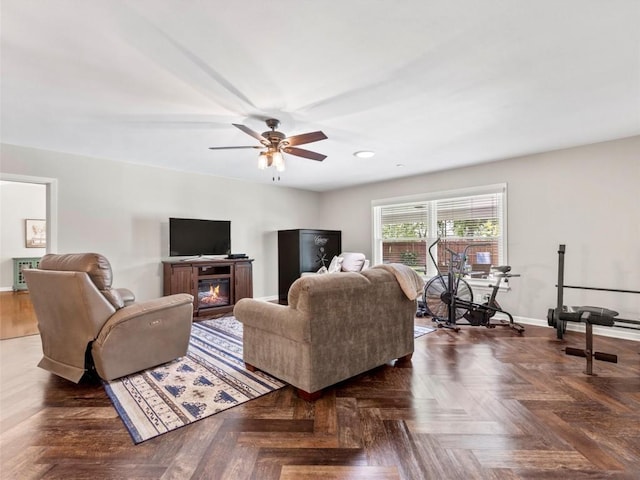 living area featuring ceiling fan and recessed lighting
