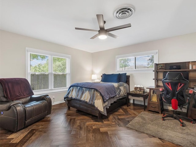 bedroom with baseboards and ceiling fan