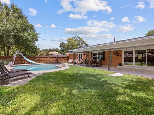 fenced backyard with a patio