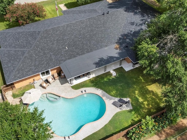 view from above of property featuring a pool area