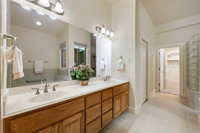 105 Outcrop View Ln, Austin, TX 78738 - full bathroom featuring double vanity and tile patterned flooring