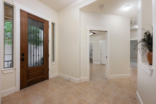 105 Outcrop View Ln, Austin, TX 78738 - entrance foyer with light tile patterned floors and ceiling fan