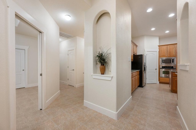 105 Outcrop View Ln, Austin, TX 78738 - corridor with recessed lighting and light tile patterned flooring