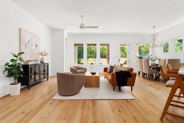 352 Moonlit Stream Pass, Dripping Springs, TX 78620 - living area with wood finished floors and a ceiling fan
