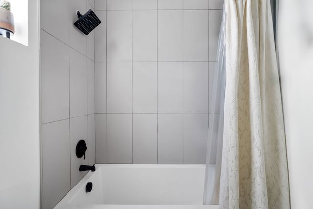 5509 Clay Ave Unit 2, Austin, TX 78756 - bathroom featuring shower / bath combo with shower curtain