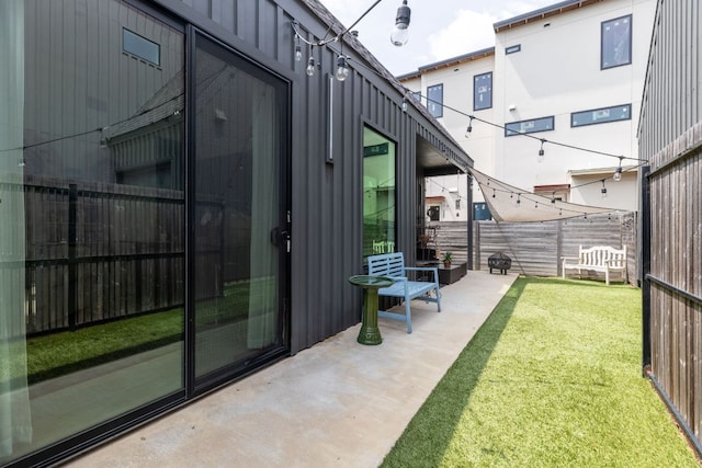 5509 Clay Ave Unit 2, Austin, TX 78756 - fenced backyard with a patio area