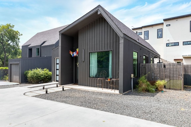 5509 Clay Ave Unit 2, Austin, TX 78756 - modern farmhouse featuring board and batten siding and a shingled roof