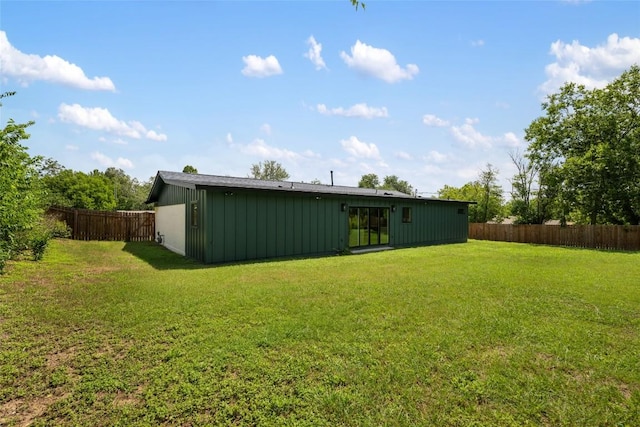 1101 Floradale Dr, Austin, TX 78753 - rear view of house featuring a fenced backyard and board and batten siding