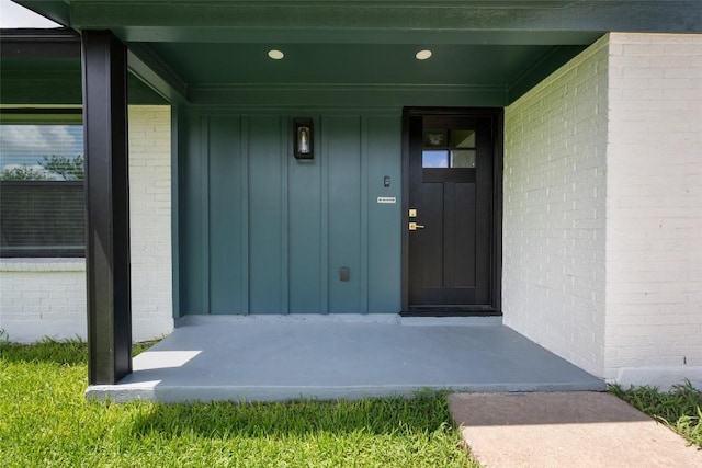 1101 Floradale Dr, Austin, TX 78753 - view of exterior entry featuring board and batten siding