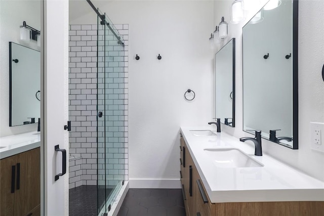 2502 W Messick Loop, Round Rock, TX 78681 - bathroom featuring a stall shower, double vanity, and tile patterned flooring