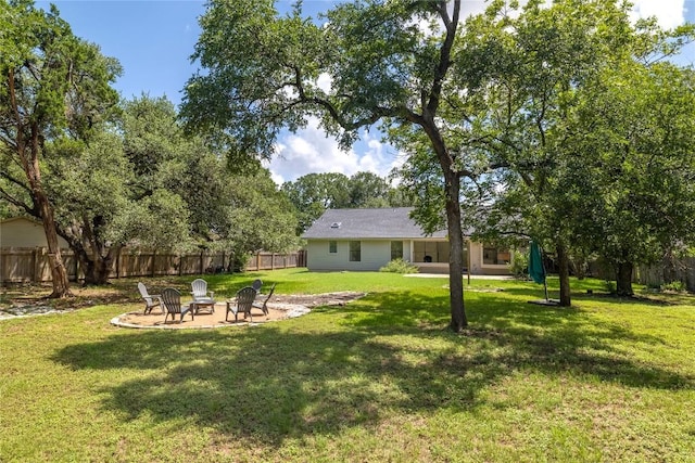 2502 W Messick Loop, Round Rock, TX 78681 - view of yard with an outdoor fire pit and a patio area