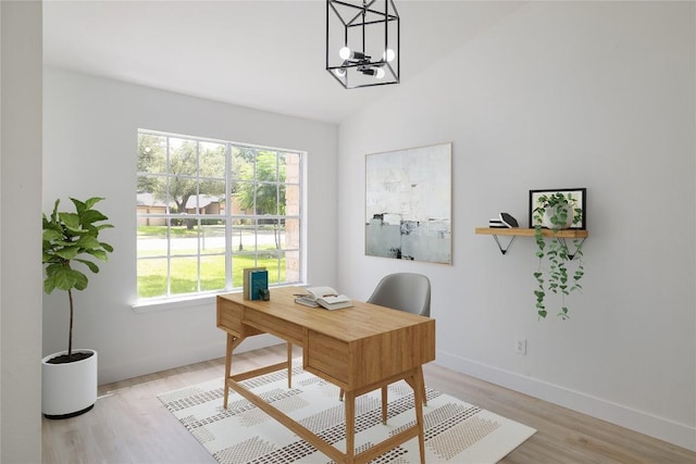 2502 W Messick Loop, Round Rock, TX 78681 - office featuring light wood finished floors, a chandelier, and vaulted ceiling