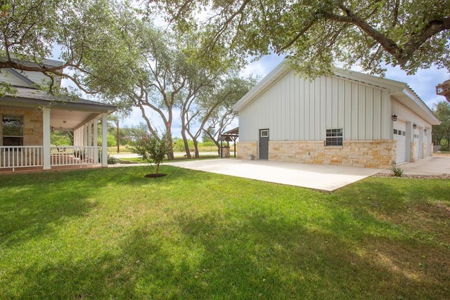 15020 Hero Way W, Leander, TX 78641 - view of green lawn with a garage