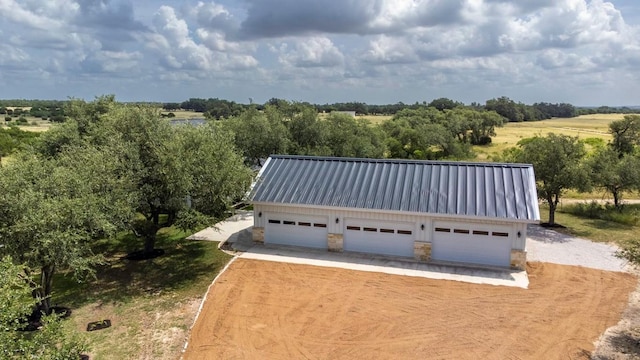 15020 Hero Way W, Leander, TX 78641 - detached garage with dirt driveway and a view of rural / pastoral area