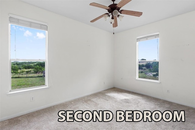 15020 Hero Way W, Leander, TX 78641 - spare room featuring carpet flooring and a ceiling fan