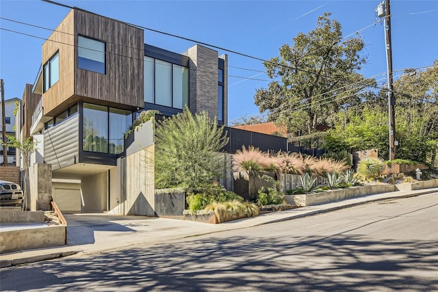 1315 W 9th St Unit B, Austin, TX 78703 - contemporary house with concrete driveway