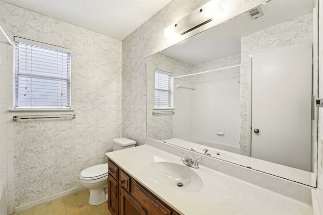 12404 Wycliff Ln, Austin, TX 78727 - bathroom featuring vanity, a textured ceiling, tile patterned flooring, and shower / washtub combination