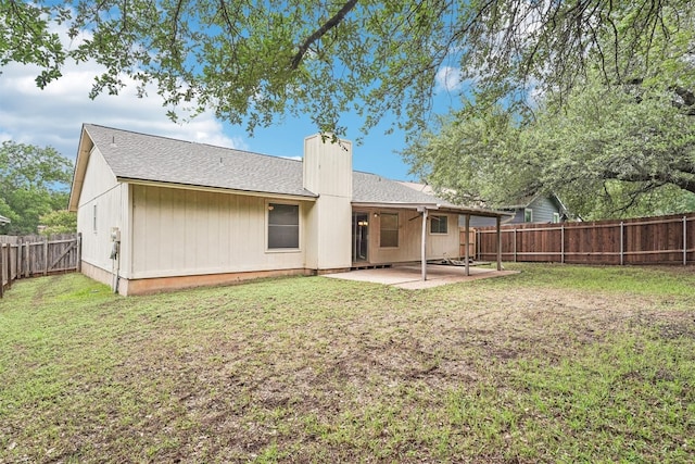 12404 Wycliff Ln, Austin, TX 78727 - back of house with a patio, a fenced backyard, a chimney, and roof with shingles