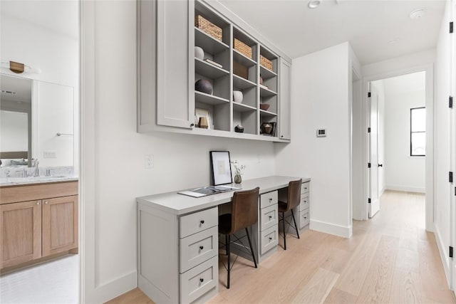 1703 Madison, Austin, TX 78757 - office space with built in study area and light wood-style floors