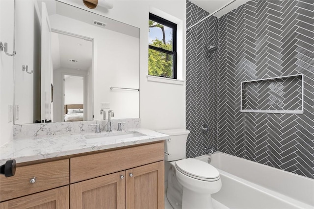 1703 Madison, Austin, TX 78757 - bathroom featuring vanity, ensuite bathroom, and shower / bathtub combination