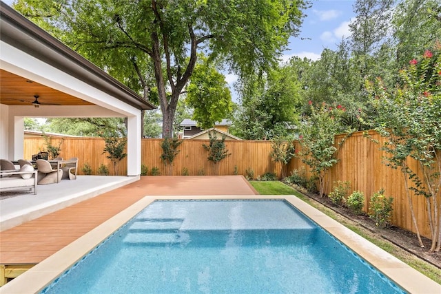 1703 Madison, Austin, TX 78757 - view of pool with a fenced backyard, a deck, and ceiling fan
