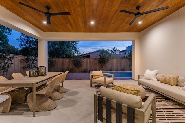1703 Madison, Austin, TX 78757 - fenced backyard featuring outdoor lounge area, a ceiling fan, outdoor dining space, and a patio