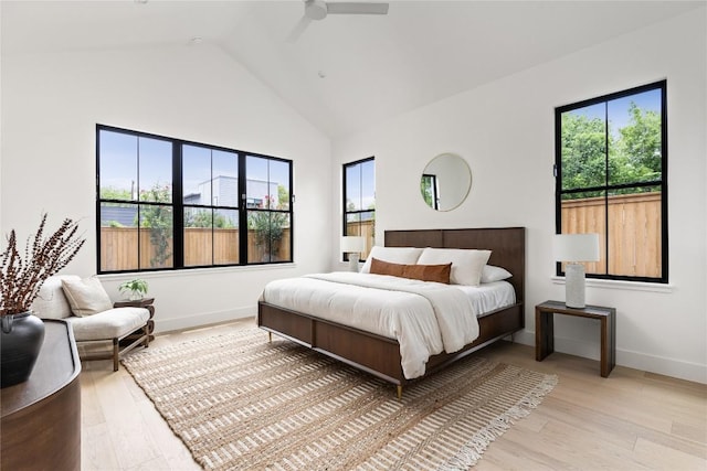 1703 Madison, Austin, TX 78757 - bedroom with high vaulted ceiling, light wood-style floors, and ceiling fan