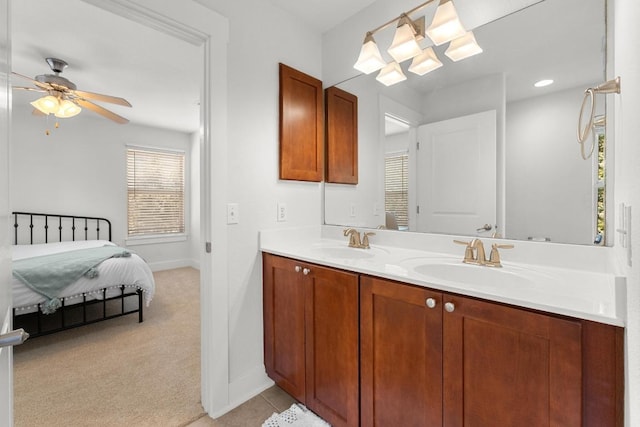 1601 Miriam Ave Unit 100, Austin, TX 78702 - ensuite bathroom featuring double vanity and a ceiling fan