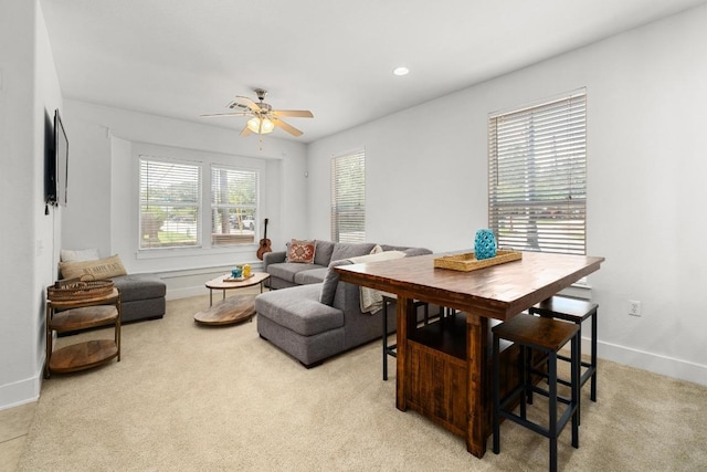 1601 Miriam Ave Unit 100, Austin, TX 78702 - living room featuring a ceiling fan and light carpet